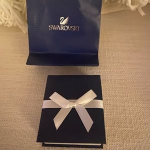 Swarovski light blue necklace and earring set.New without tags.